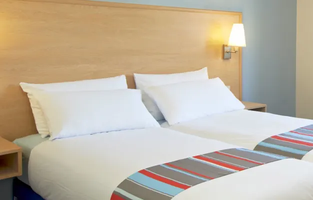 Photo of the bed in a Standard Twin Room in Perth A9 hotel