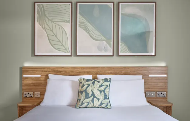 Photo of the bed in a Family SuperRoom in Gatwick Airport Central hotel